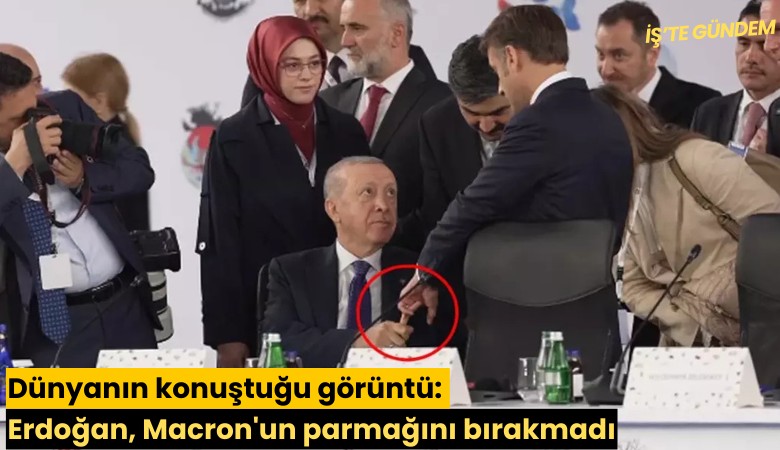 Dünyanın konuştuğu görüntü: Erdoğan, Macron'un parmağını bırakmadı